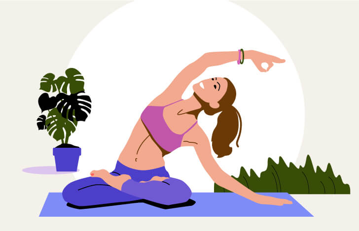ヨガのポーズをとる女性