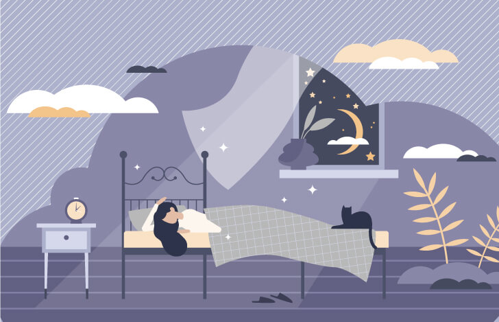 ベッドで眠る女性