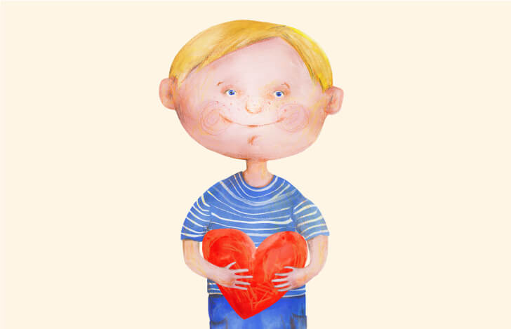 赤いハートを抱える子供