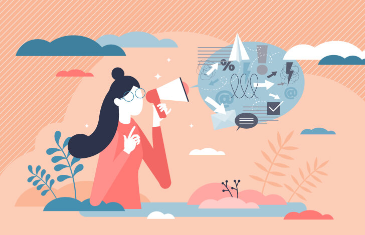 拡声器でメッセージを発する女性