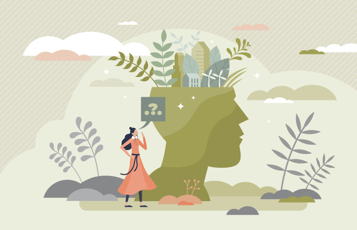 考える人の頭とそれを見上げる女性