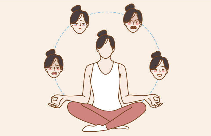 安楽座で座る女性と様々な感情を表す顔のイラスト