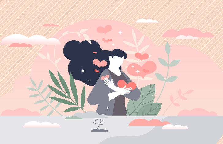 自分を抱きしめる女性