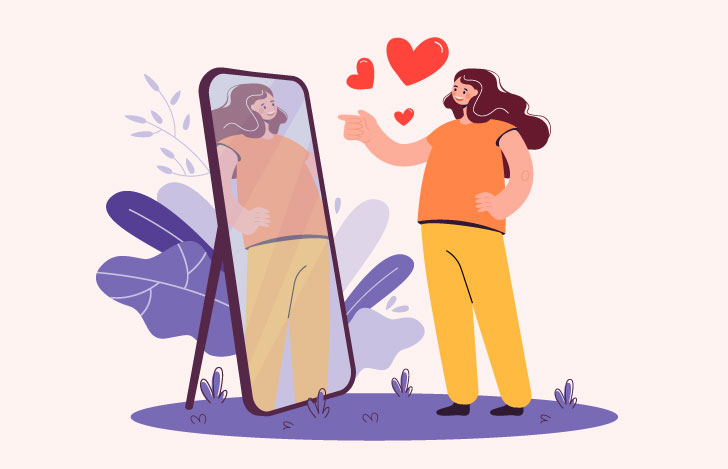 全身大の鏡に映る自分を褒める女性