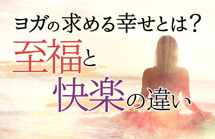 海に向かって座る女性の背中