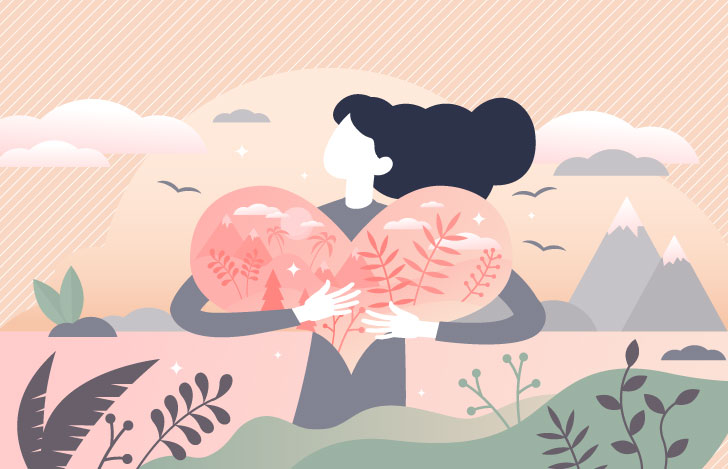 ハートを抱き抱えた女性