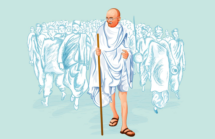 マハトマ・ガンディーと後に続く人々の行進