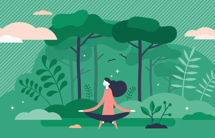 森の中で瞑想する一人の女性
