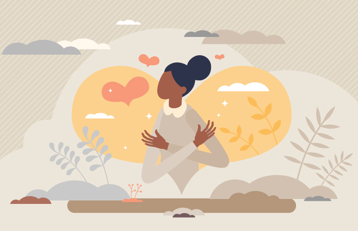 自分自身を抱きしめる女性