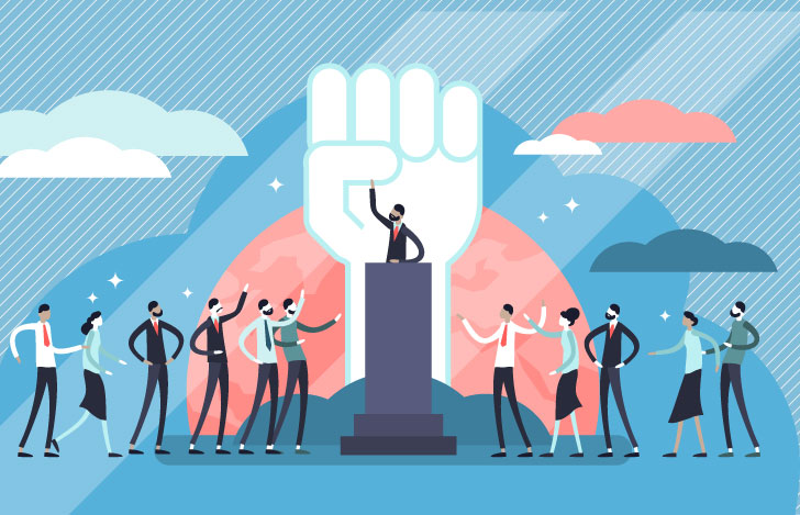 中央のステージに立つ人を称賛する人々