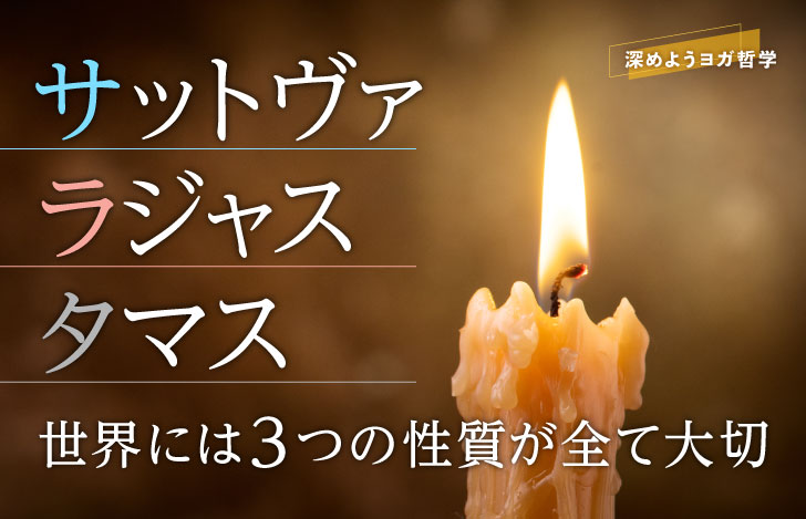 薄暗がりで灯る1本のロウソク