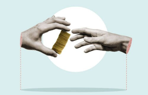 お金をやりとりしている手と手