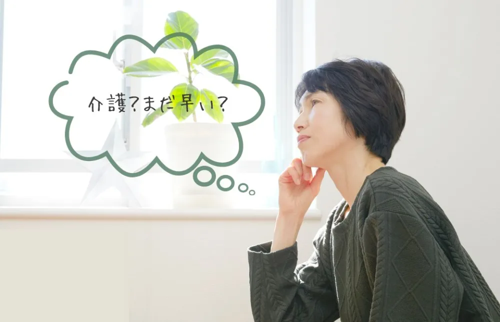 考える女性の画像